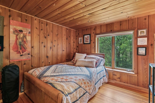 8482 150th St E, Northfield Twp, MN 55057 - bedroom featuring wooden walls, hardwood / wood-style flooring, and wooden ceiling