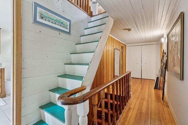 8482 150th St E, Northfield Twp, MN 55057 - stairway with wooden ceiling, hardwood / wood-style floors, and wooden walls