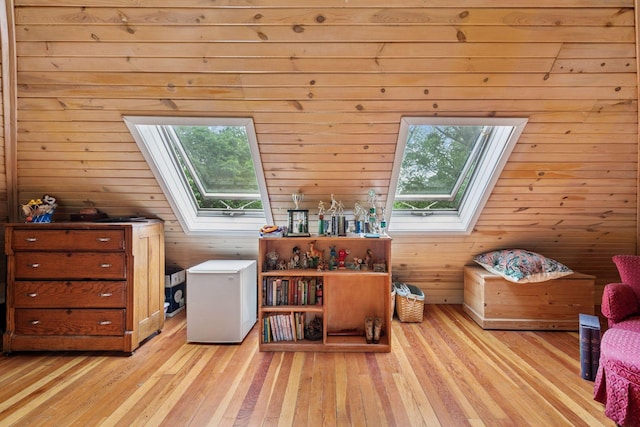 8482 150th St E, Northfield Twp, MN 55057 - sitting room with a skylight, wooden walls, and light wood-style flooring