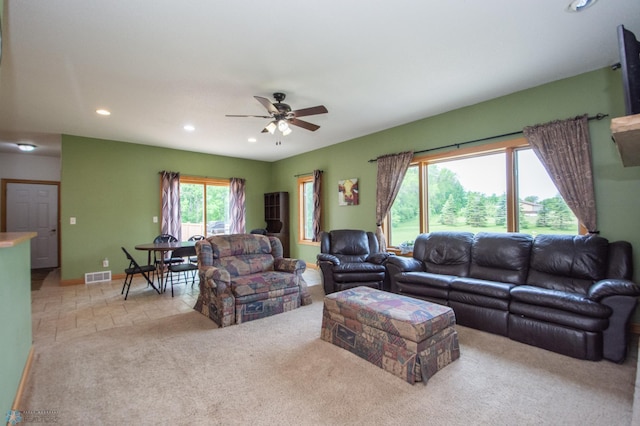 11905 Hunter Dr, Lake Park Twp, MN 56554 - tiled living area with recessed lighting, a ceiling fan, carpet floors, and baseboards