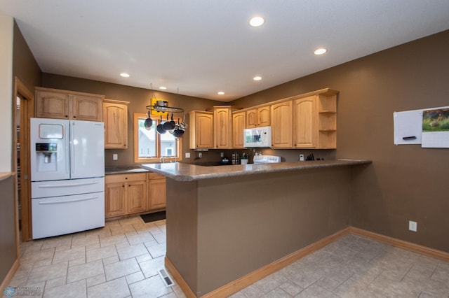 11905 Hunter Dr, Lake Park Twp, MN 56554 - kitchen with white appliances, a peninsula, recessed lighting, baseboards, and light brown cabinets