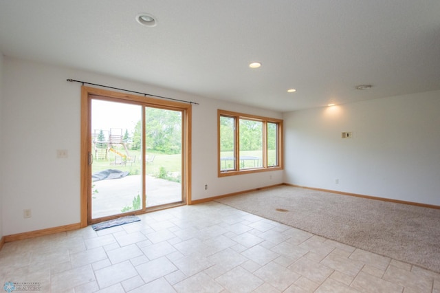 11905 Hunter Dr, Lake Park Twp, MN 56554 - spare room with baseboards and recessed lighting