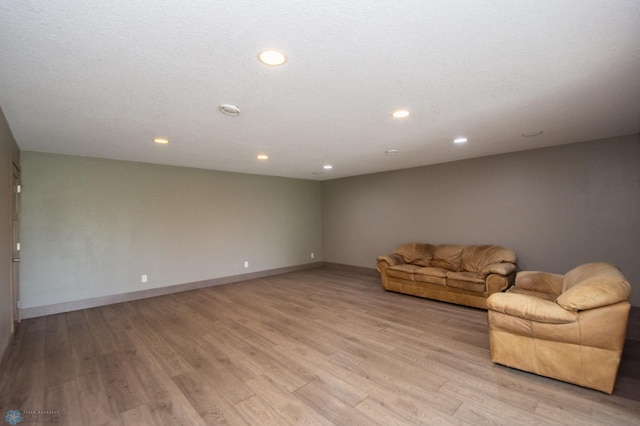 11905 Hunter Dr, Lake Park Twp, MN 56554 - unfurnished living room featuring light wood-style floors, recessed lighting, and baseboards