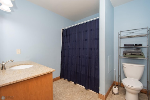 11905 Hunter Dr, Lake Park Twp, MN 56554 - bathroom with vanity, toilet, baseboards, tile patterned flooring, and a shower with shower curtain