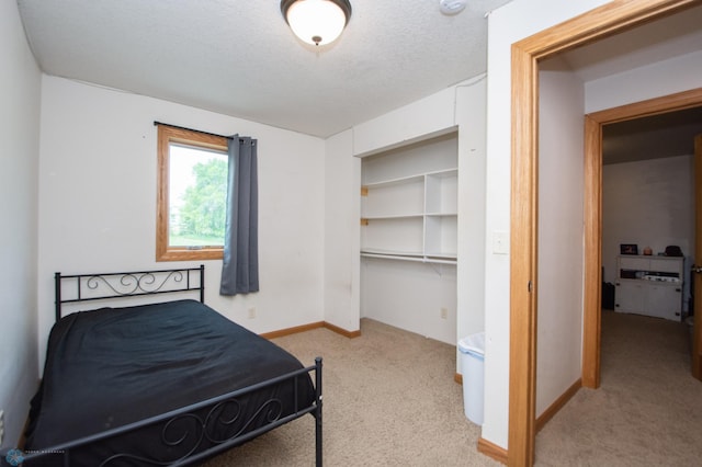 11905 Hunter Dr, Lake Park Twp, MN 56554 - carpeted bedroom featuring a closet and baseboards