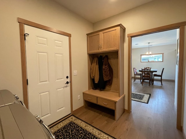 1504 3rd Ave N, Cold Spring, MN 56320 - mudroom featuring light wood-style floors and a chandelier
