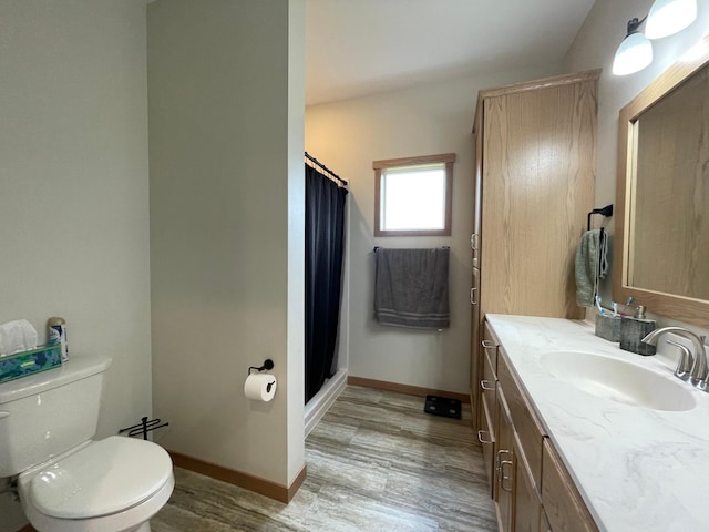 1504 3rd Ave N, Cold Spring, MN 56320 - full bath with vanity, wood finished floors, and a shower with shower curtain