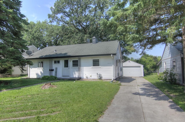 1979 Polaris Pl N, Saint Paul, MN 55109 - view of front of house with a garage, an outdoor structure, a front yard, a chimney, and roof with shingles