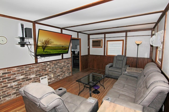 1979 Polaris Pl N, Saint Paul, MN 55109 - living room featuring wood finished floors, wainscoting, brick wall, and wooden walls