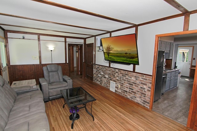 1979 Polaris Pl N, Saint Paul, MN 55109 - living area featuring wood finished floors, wainscoting, and wood walls