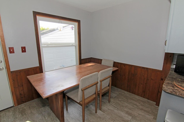 1979 Polaris Pl N, Saint Paul, MN 55109 - dining area featuring wainscoting, wood walls, and wood finished floors