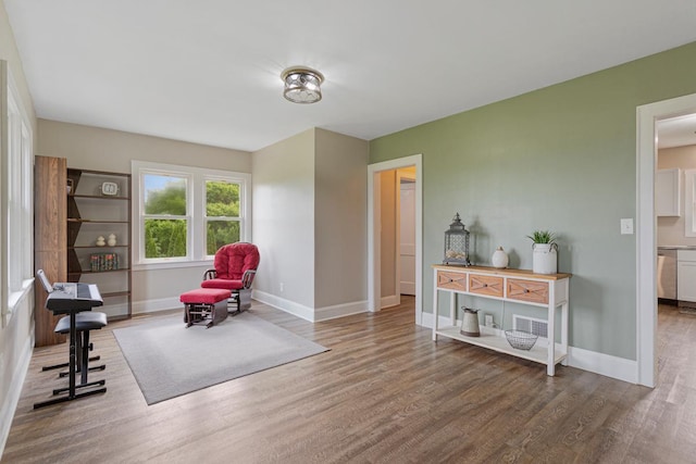28145 State Highway 112, Le Sueur, MN 56058 - sitting room featuring wood finished floors and baseboards