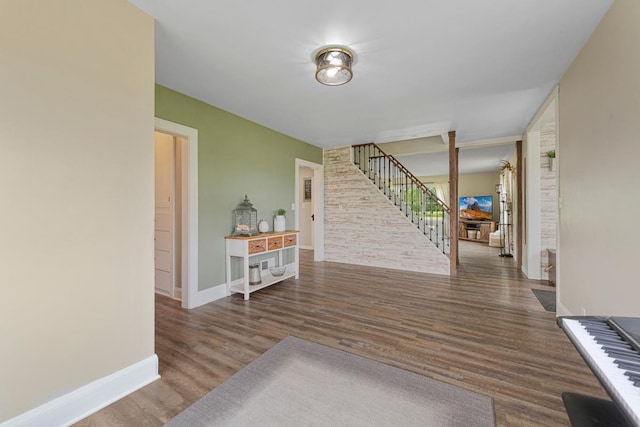 28145 State Highway 112, Le Sueur, MN 56058 - foyer entrance with stairway, wood finished floors, and baseboards