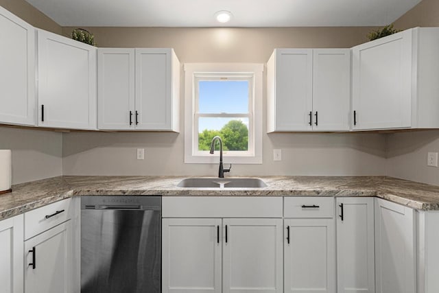 28145 State Highway 112, Le Sueur, MN 56058 - kitchen with stainless steel dishwasher, a sink, white cabinetry, light countertops, and recessed lighting