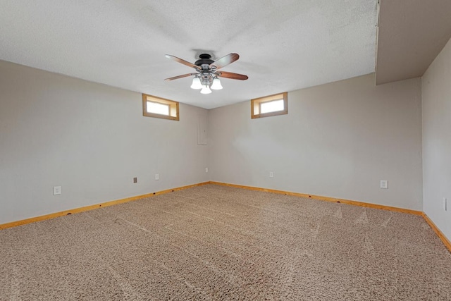 28145 State Highway 112, Le Sueur, MN 56058 - carpeted empty room featuring baseboards, a textured ceiling, and ceiling fan