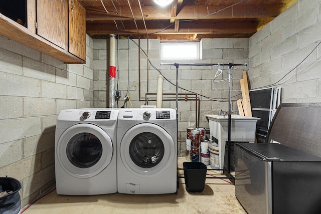 28145 State Highway 112, Le Sueur, MN 56058 - laundry room with cabinet space and washer and clothes dryer