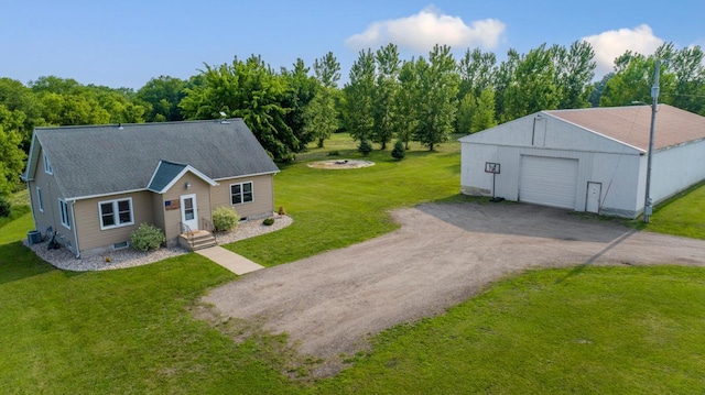 28145 State Highway 112, Le Sueur, MN 56058 - view of front of property with driveway, a garage, an outdoor structure, and a front yard