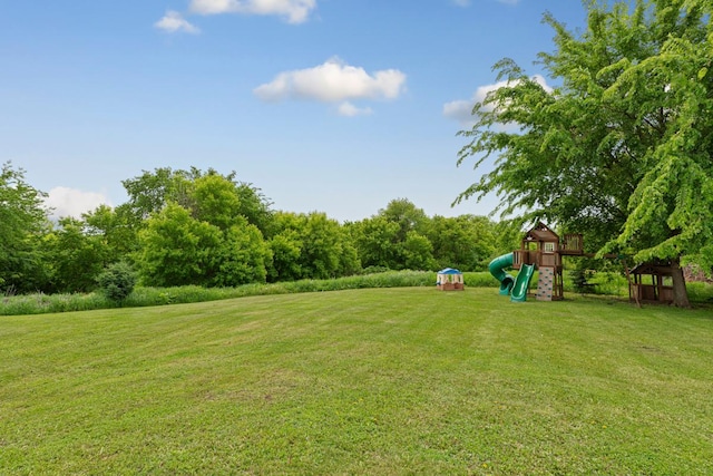 28145 State Highway 112, Le Sueur, MN 56058 - view of green lawn with a playground