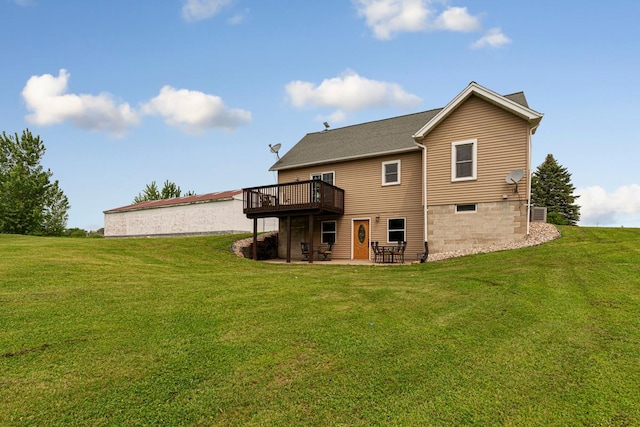 28145 State Highway 112, Le Sueur, MN 56058 - back of house with a deck, a lawn, and a patio area