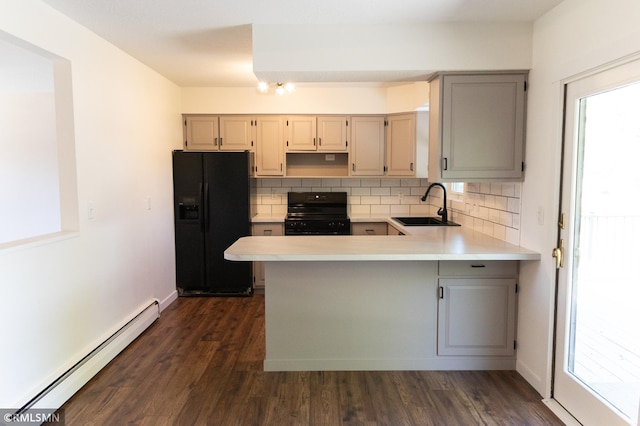 1322 17th St W, Hastings, MN 55033 - kitchen with black appliances, a sink, a baseboard radiator, light countertops, and gray cabinetry
