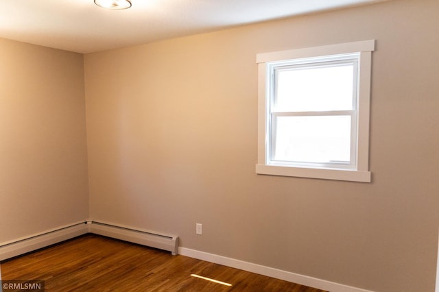 1322 17th St W, Hastings, MN 55033 - unfurnished room featuring dark wood-type flooring and baseboards