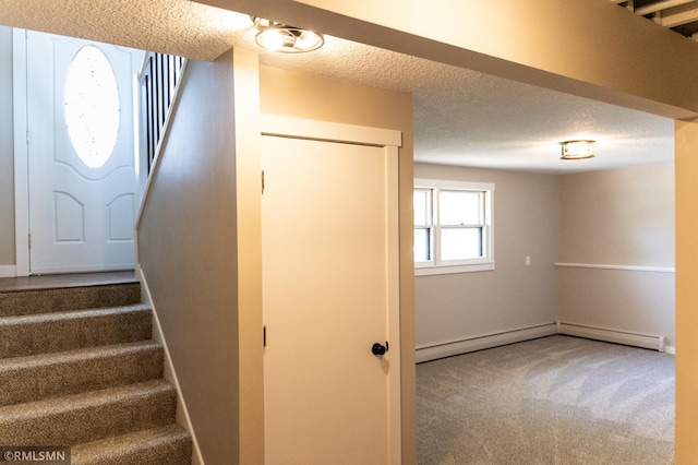 1322 17th St W, Hastings, MN 55033 - stairs featuring a textured ceiling, carpet, and baseboards