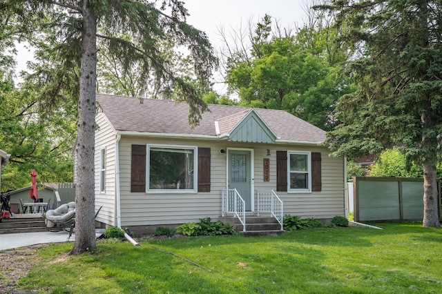 2020 7th St SW, Willmar, MN 56201 - view of front of house featuring roof with shingles and entry steps