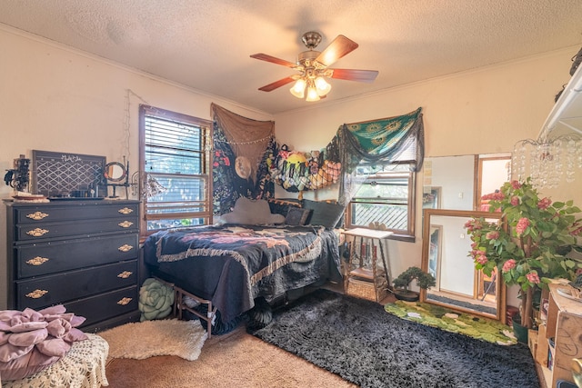 687 Jenks Ave, Saint Paul, MN 55106 - carpeted bedroom featuring ornamental molding, a textured ceiling, and ceiling fan