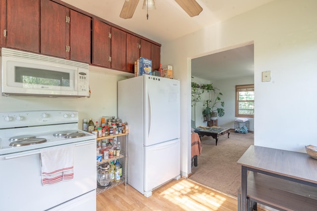 687 Jenks Ave, Saint Paul, MN 55106 - kitchen with white appliances, ceiling fan, and light wood finished floors