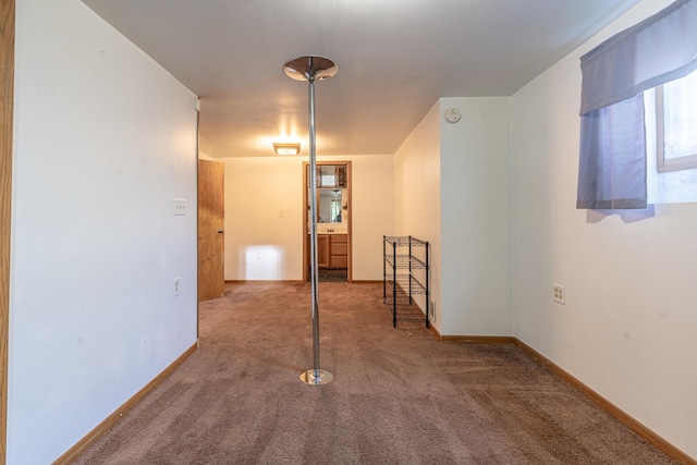 687 Jenks Ave, Saint Paul, MN 55106 - empty room featuring carpet flooring, baseboards, and a smoke detector