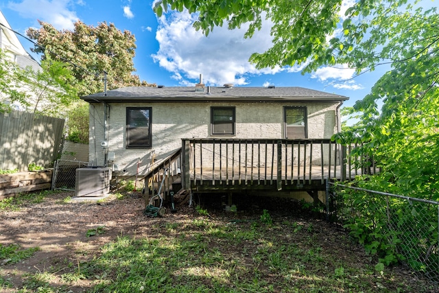 687 Jenks Ave, Saint Paul, MN 55106 - back of house featuring a wooden deck and central AC unit