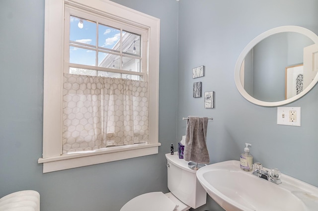 244 Macalester St, Saint Paul, MN 55105 - half bathroom with a sink and toilet