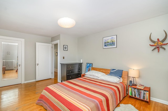 244 Macalester St, Saint Paul, MN 55105 - bedroom with radiator and wood finished floors
