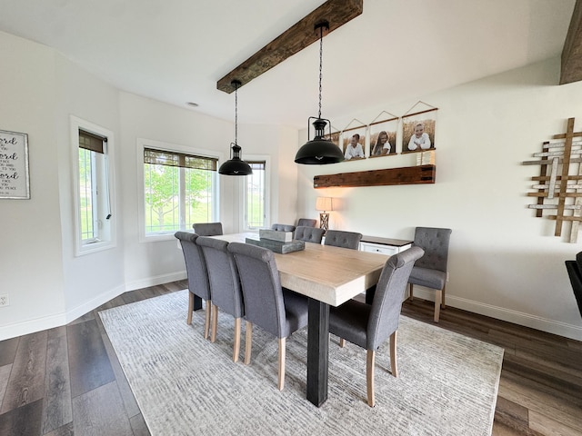 1207 Martin St, Fergus Falls, MN 56537 - dining room with dark wood finished floors, baseboards, and beamed ceiling