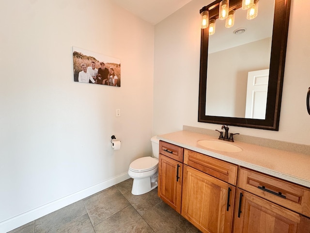1207 Martin St, Fergus Falls, MN 56537 - bathroom with vanity, toilet, and baseboards