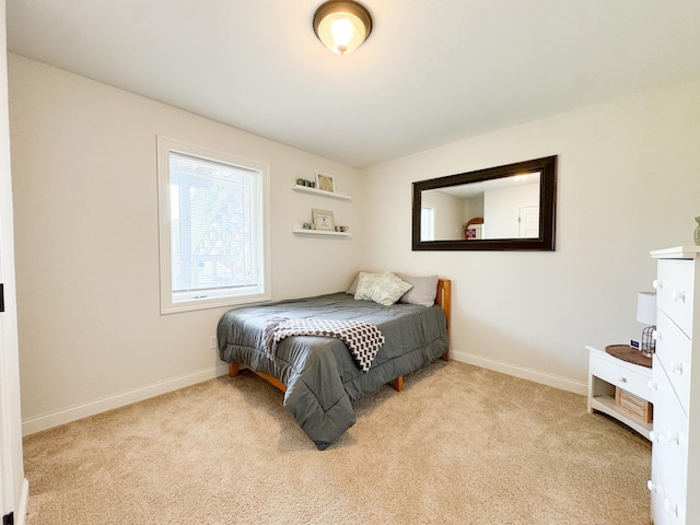 1207 Martin St, Fergus Falls, MN 56537 - bedroom featuring light carpet and baseboards
