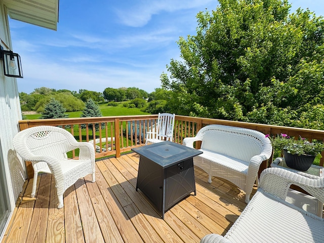 1207 Martin St, Fergus Falls, MN 56537 - wooden terrace featuring view of wooded area