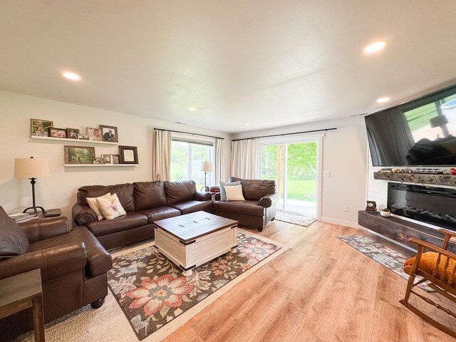 1207 Martin St, Fergus Falls, MN 56537 - living room with light wood finished floors and recessed lighting