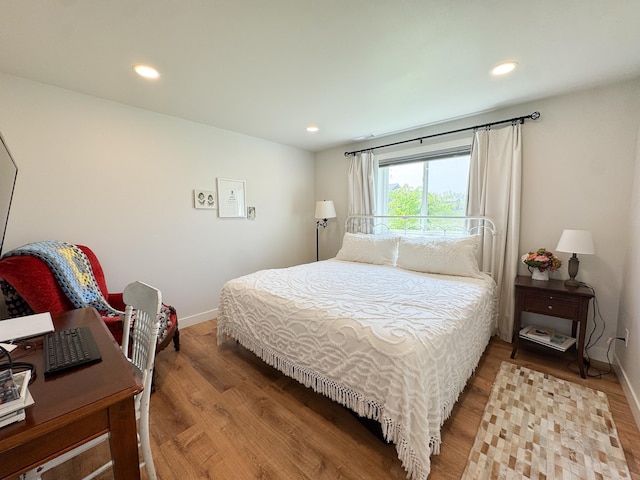 1207 Martin St, Fergus Falls, MN 56537 - bedroom featuring wood finished floors, baseboards, and recessed lighting
