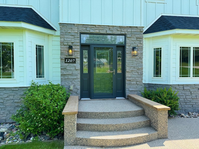 1207 Martin St, Fergus Falls, MN 56537 - property entrance with stone siding and board and batten siding