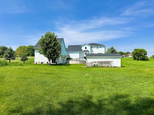 1207 Martin St, Fergus Falls, MN 56537 - rear view of house with a lawn and roof with shingles