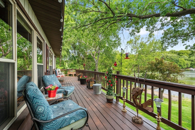 597 Emmet Rd, Lynden Twp, MN 55320 - wooden terrace featuring a water view and view of scattered trees