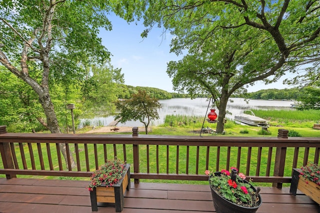 597 Emmet Rd, Lynden Twp, MN 55320 - wooden deck featuring a water view and a yard
