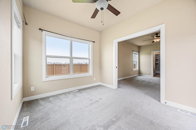 842 Rania Way W, West Fargo, ND 58078 - carpeted empty room with a ceiling fan and baseboards