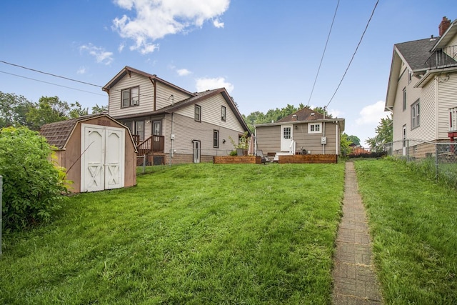 915 Cottage Ave E, Saint Paul, MN 55106 - rear view of house featuring entry steps