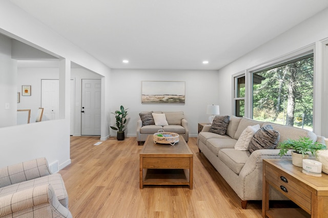 13001 Glenview Dr, Burnsville, MN 55337 - living area with light wood-style floors and recessed lighting