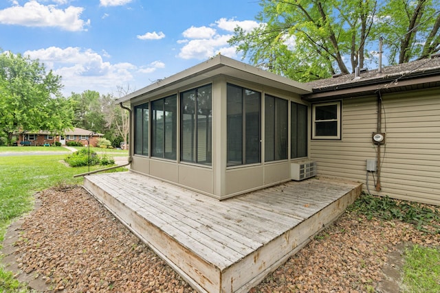 13001 Glenview Dr, Burnsville, MN 55337 - rear view of house featuring a sunroom and a lawn