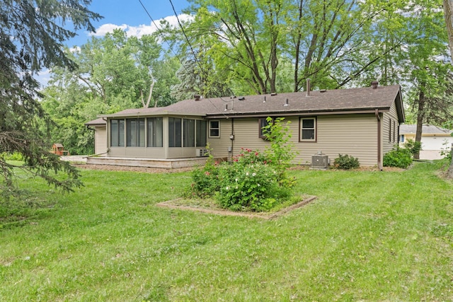 13001 Glenview Dr, Burnsville, MN 55337 - back of property with a sunroom and a yard