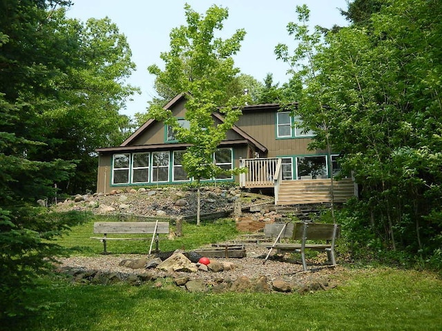 3749 Grizzly Ln, Barnum Twp, MN 55707 - rear view of house featuring a wooden deck