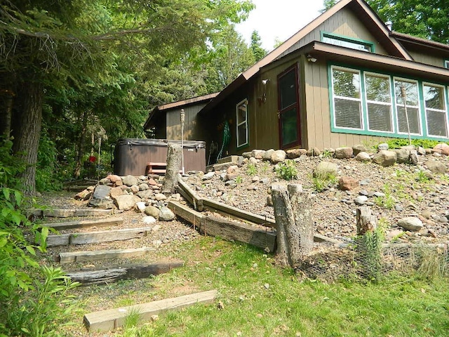 3749 Grizzly Ln, Barnum Twp, MN 55707 - view of home's exterior featuring a hot tub